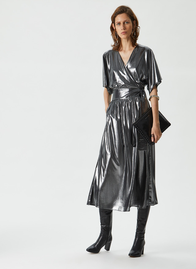 Tres vestidos de Adolfo Domínguez con rebajas de hasta el 65 por ciento