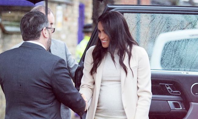 Megan acudiendo a un acto oficial con vestido de H&M