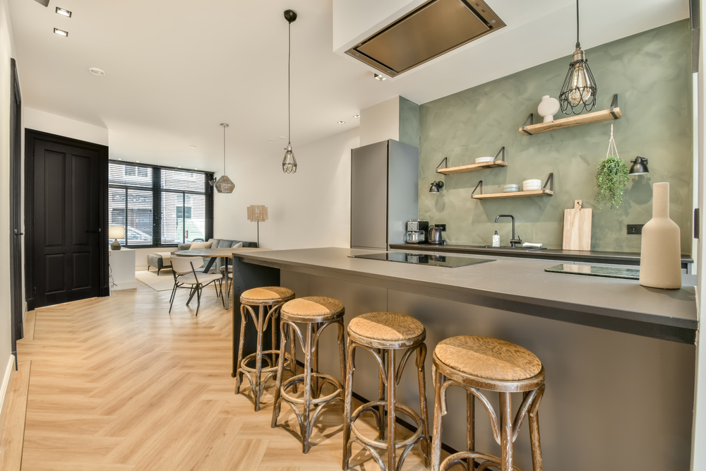 Cocinas abiertas al salón: ¿Mejor con isla o con barra?